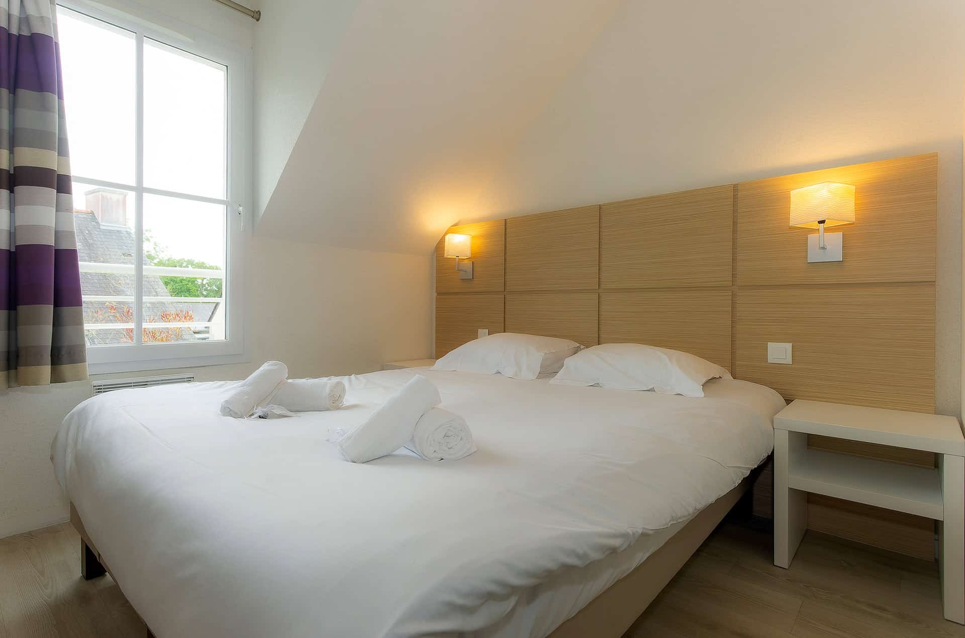 Exemple de chambre d'une maison 3 pièces pour 6 personnes de la résidence de vacances Goélia Le Domaine de Pont-Aven à Pont-Aven en Bretagne sud Exemple de chambre d'une maison 3 pièces pour 6 personnes de la résidence de vacances Goélia Le Domaine de Pont-Aven à Pont-Aven en Bretagne sud