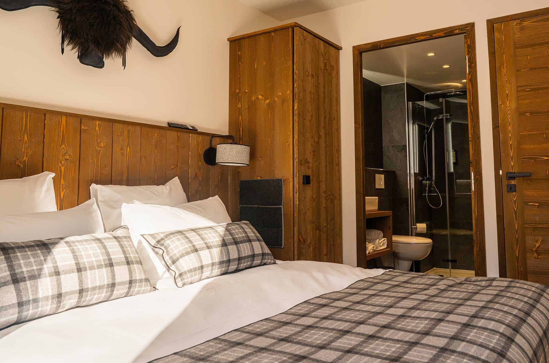 Exemple de chambre double d'un appartement de de la résidence de vacances L'Ecrin d'Argent à Valmorel
