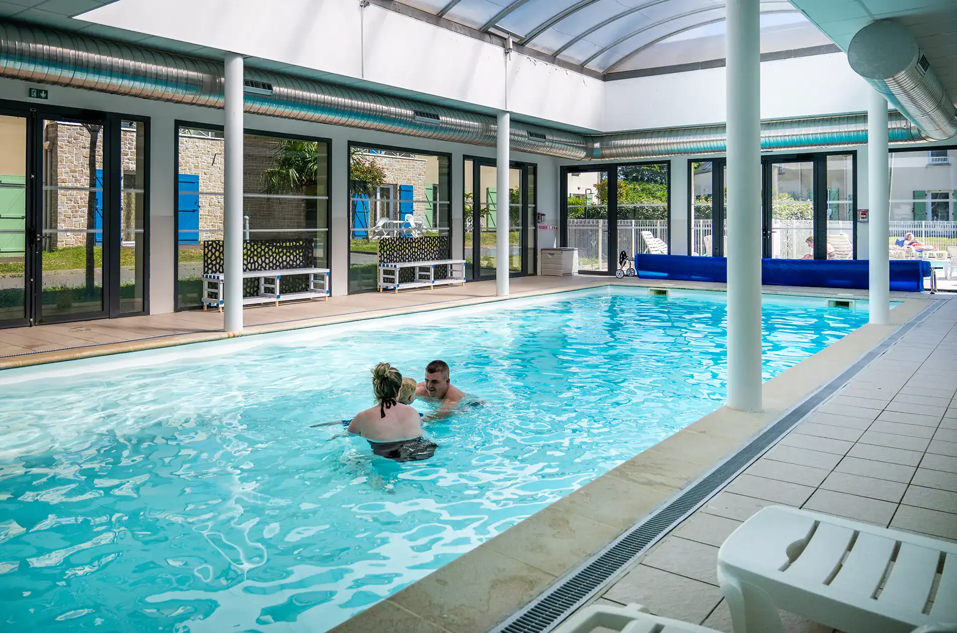 Heated indoor swimming pool at the Goélia Le Domaine des Mauriers holiday residence 