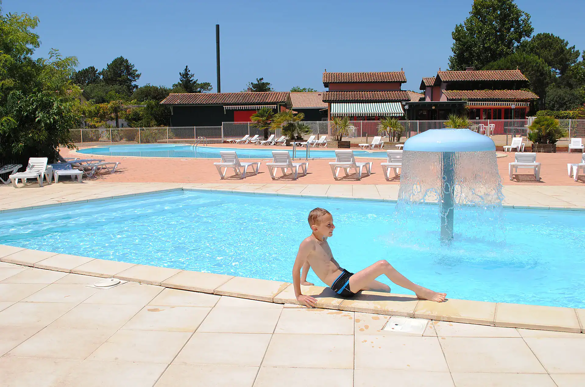 Outdoor swimming pools at the Goélia Les Rives de St Brice holiday residence in Arès, near Arcachon Bay