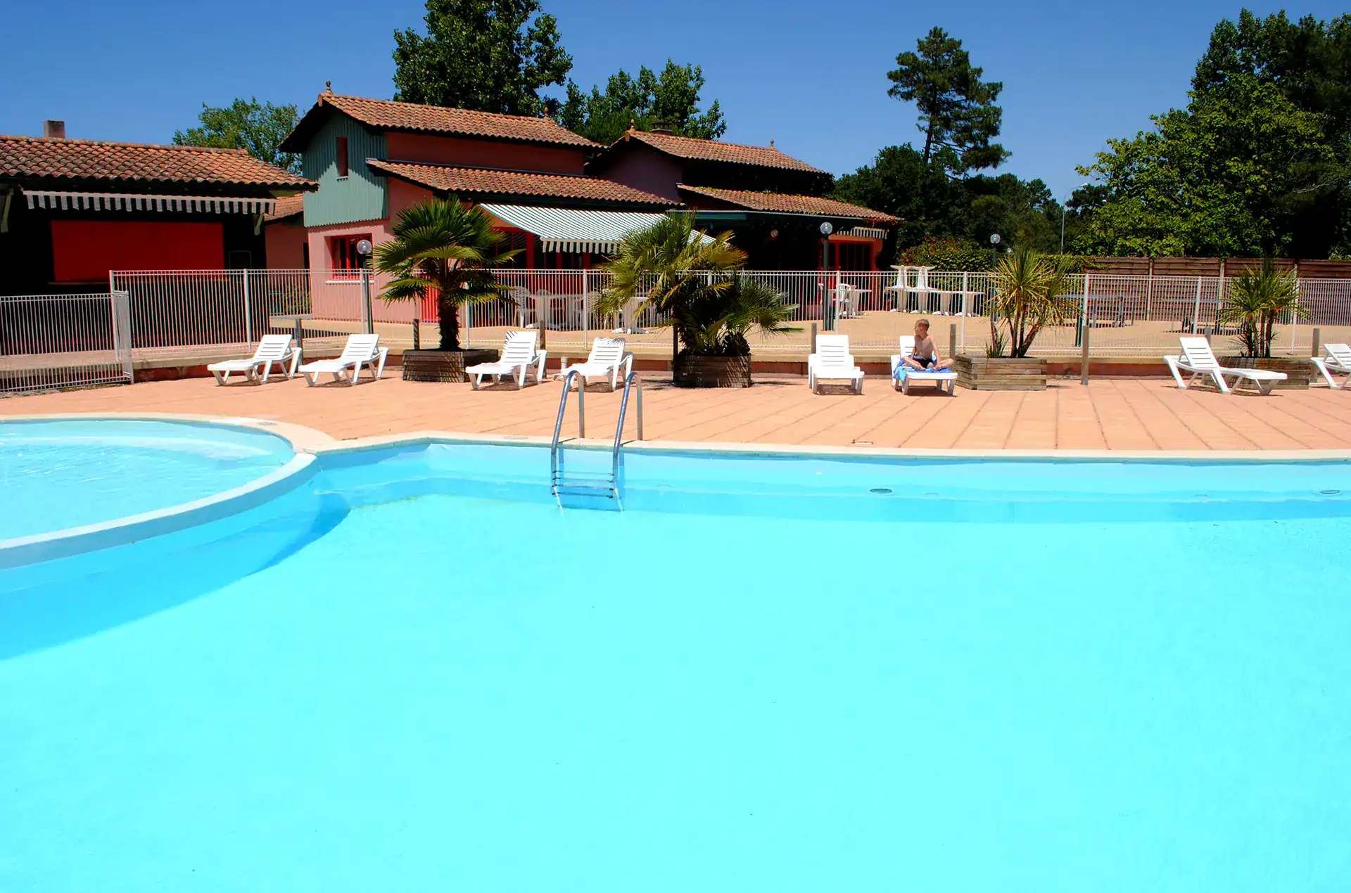 Outdoor swimming pools at the Goélia Les Rives de St Brice holiday residence in Arès, near Arcachon Bay