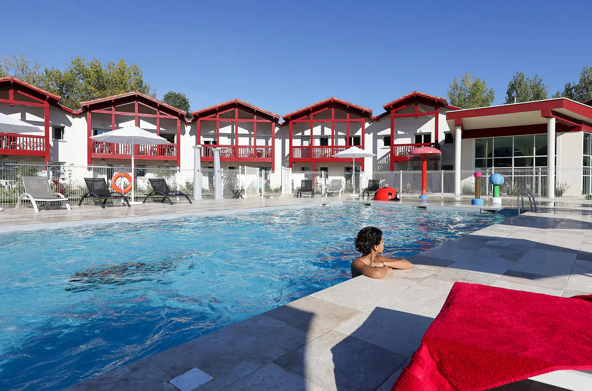 Heated outdoor swimming pool  at the Goélia Le Domaine d'Uhaina holiday residence in Urrugne in the Basque Country