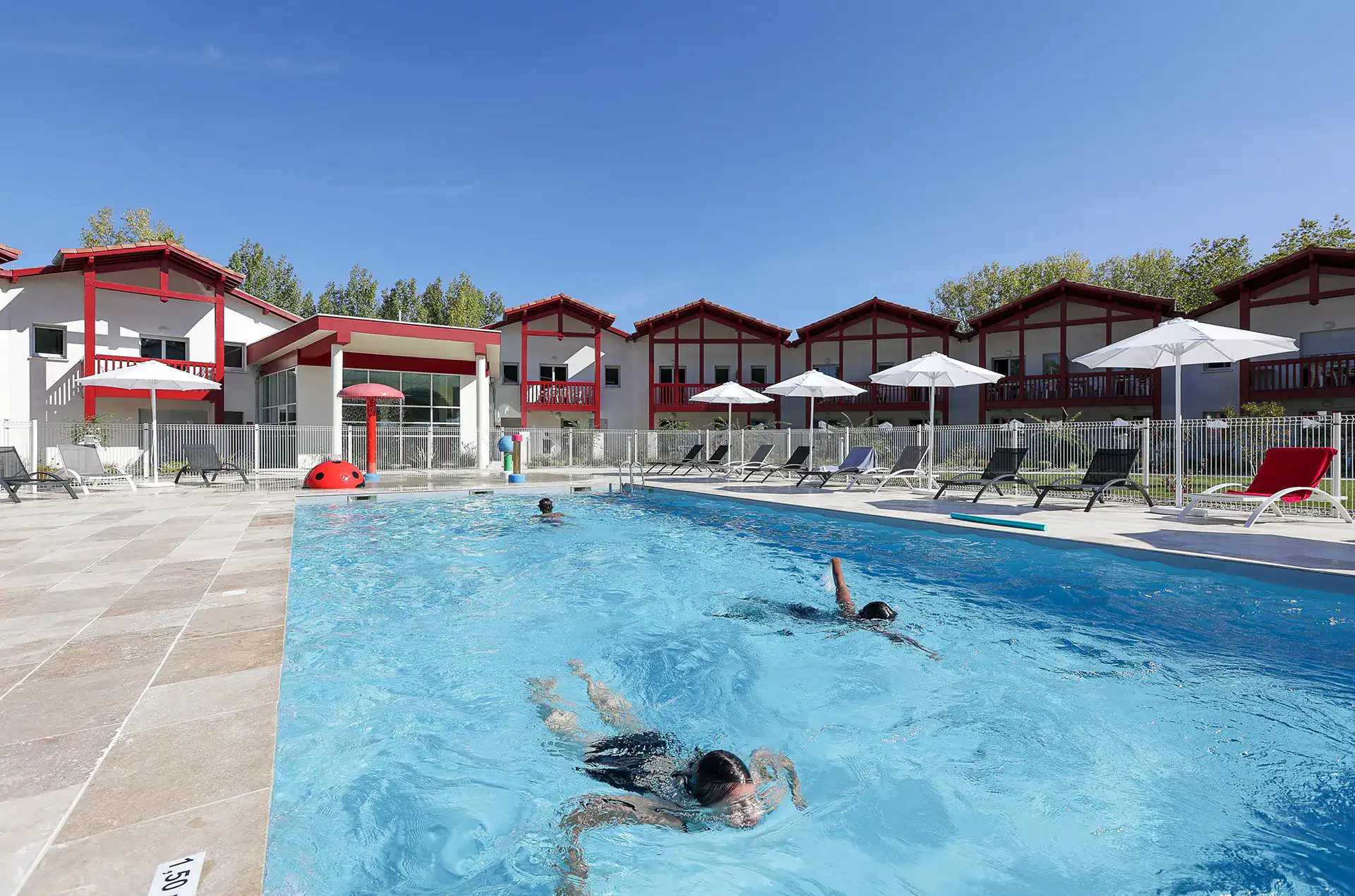 Heated outdoor  swimming pool at the Goélia Le Domaine d'Uhaina holiday residence in Urrugne in the Basque Country