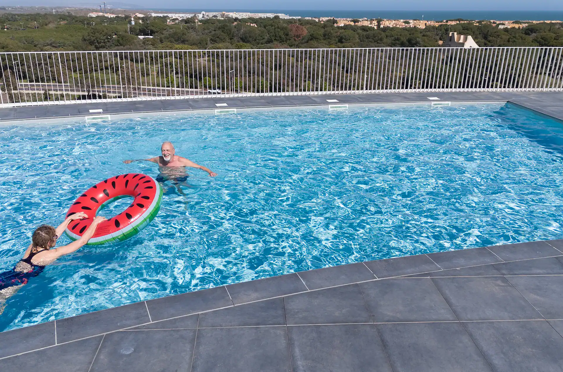 Heated outdoor swimming-pool at the  Goélia Le Sylène holiday residence in Cap d'Agde