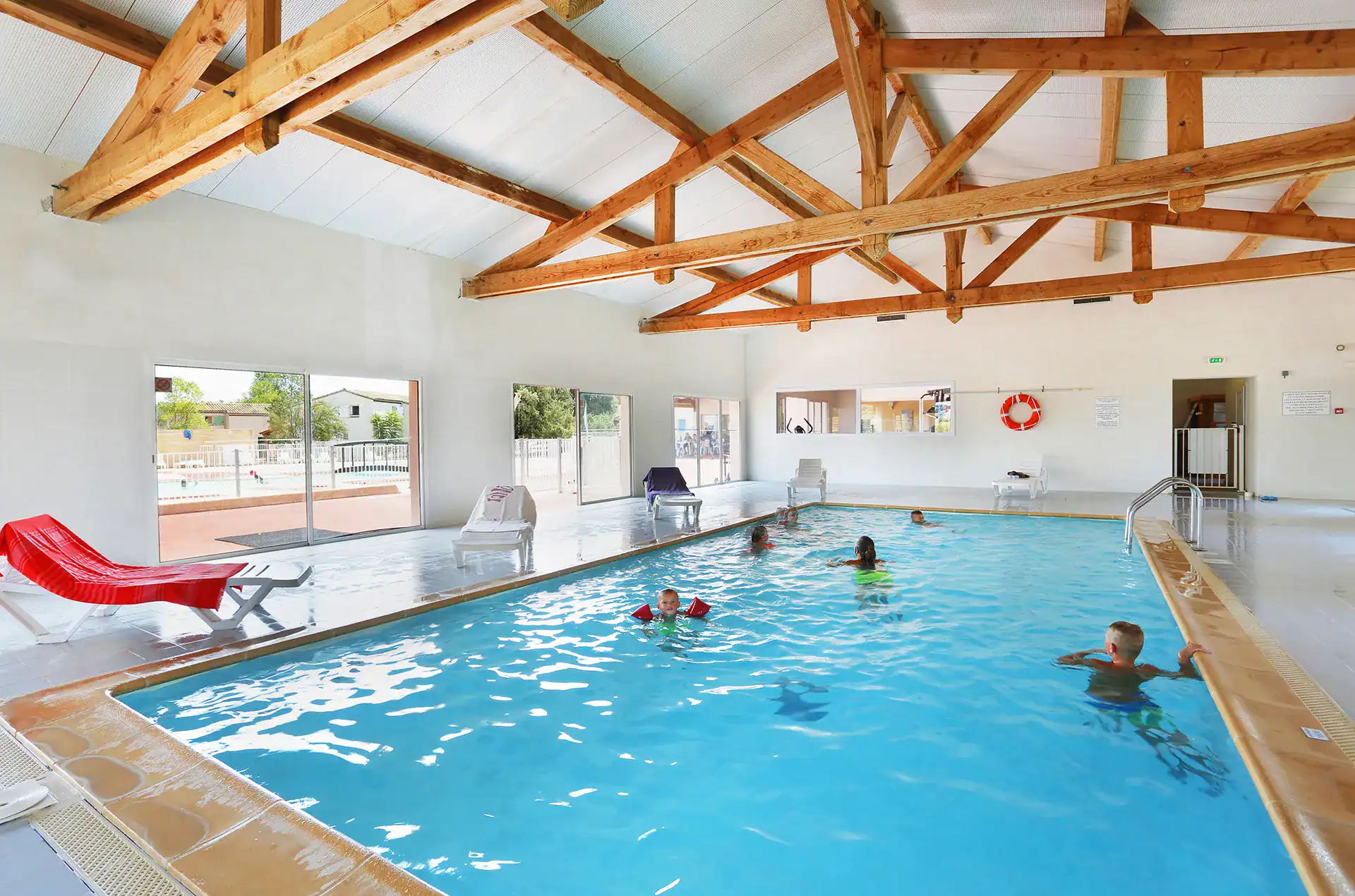 Heated indoor swimming pool at the Goélia Les Portes des Cévennes holiday residence in Sauve