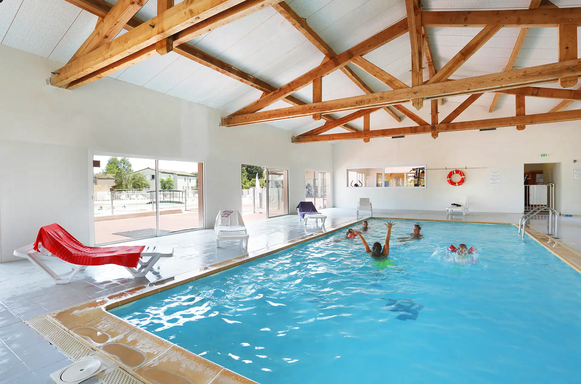 Heated indoor swimming pool at the Goélia Les Portes des Cévennes holiday residence in Sauve