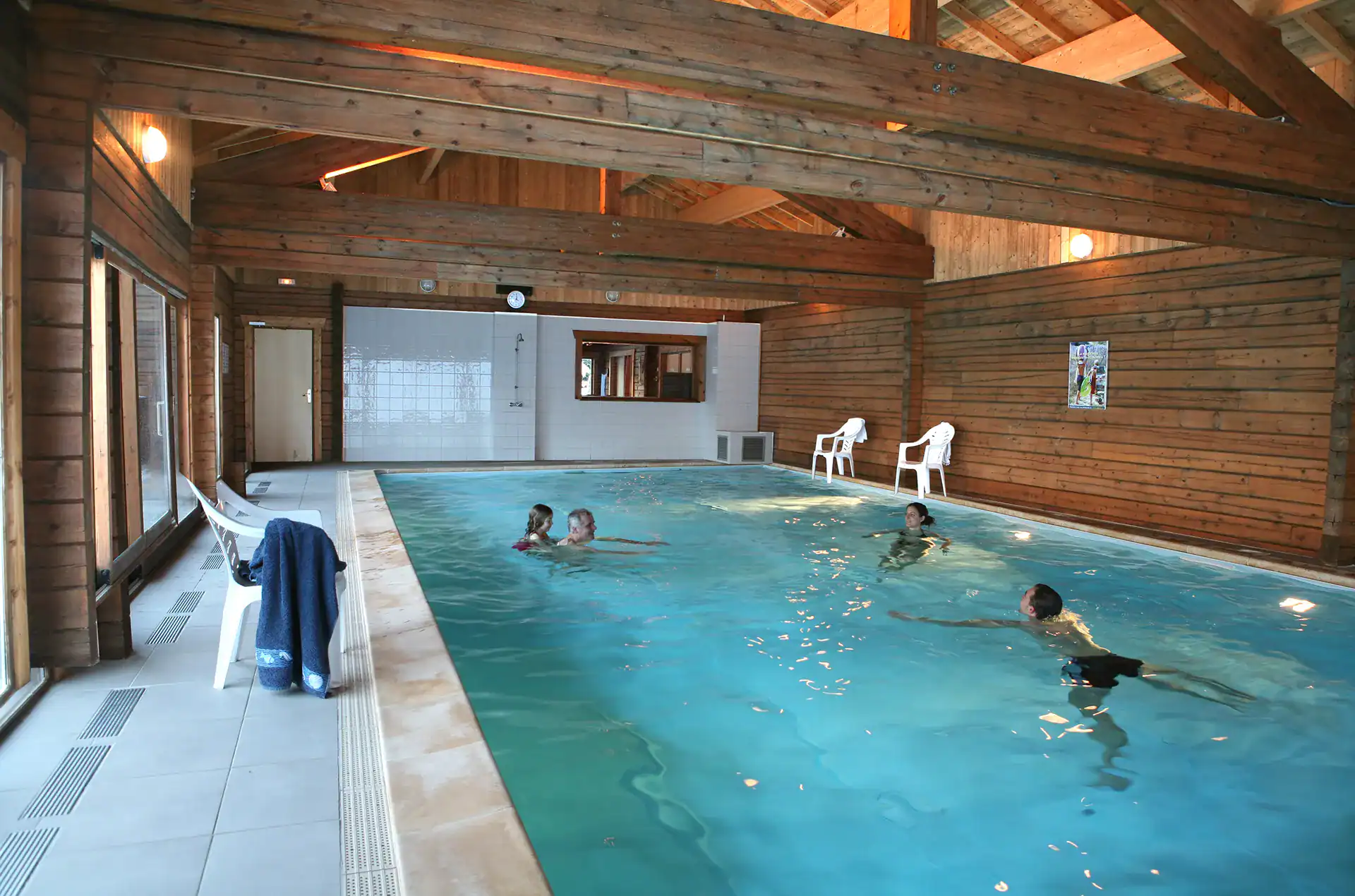 Heated indoor swimming-pool at the Goélia Les Chalets du Bois de Champelle holiday residence in Morillon 