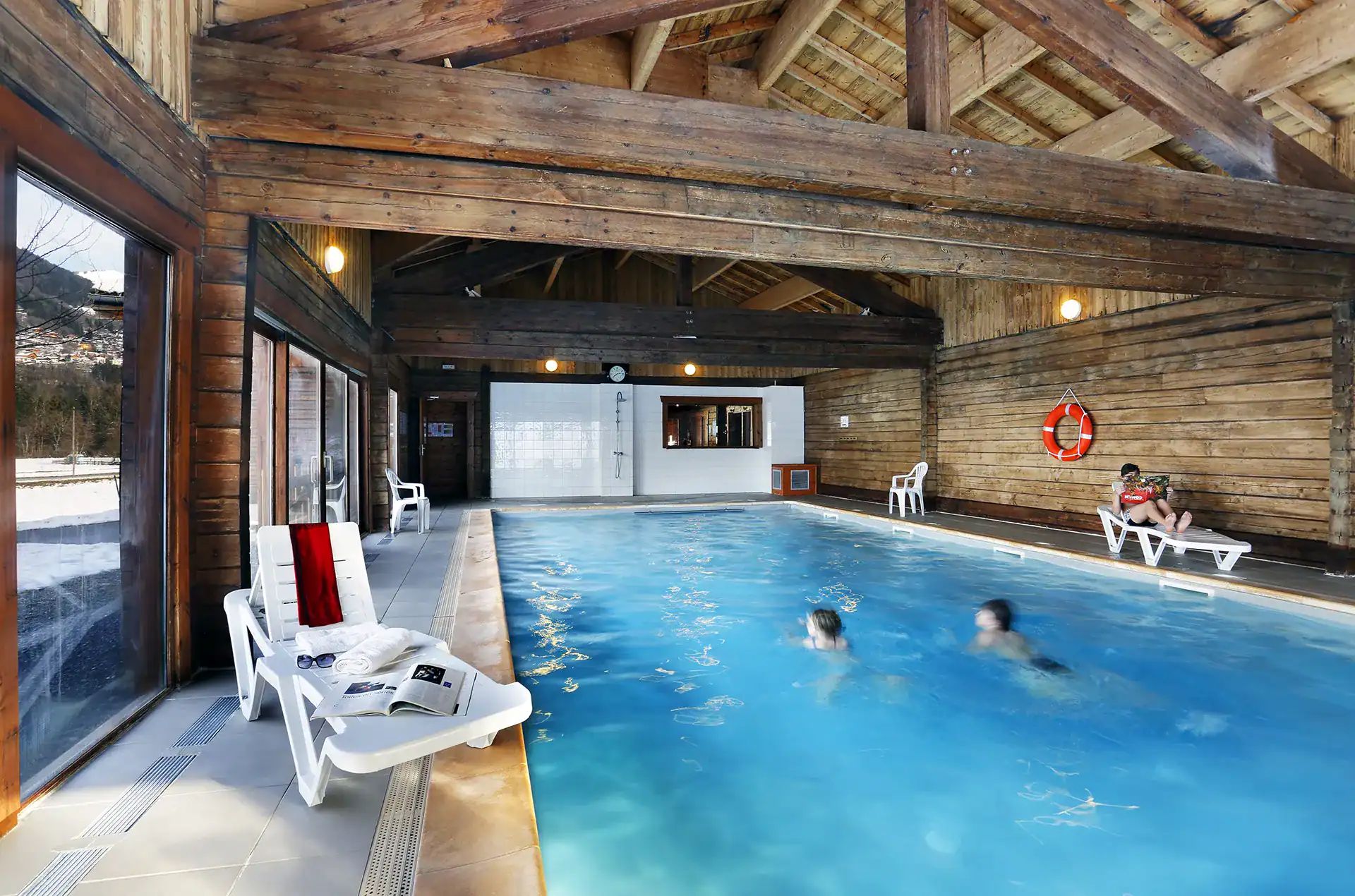 Heated indoor swimming-pool at the Goélia Les Chalets du Bois de Champelle holiday residence in Morillon 