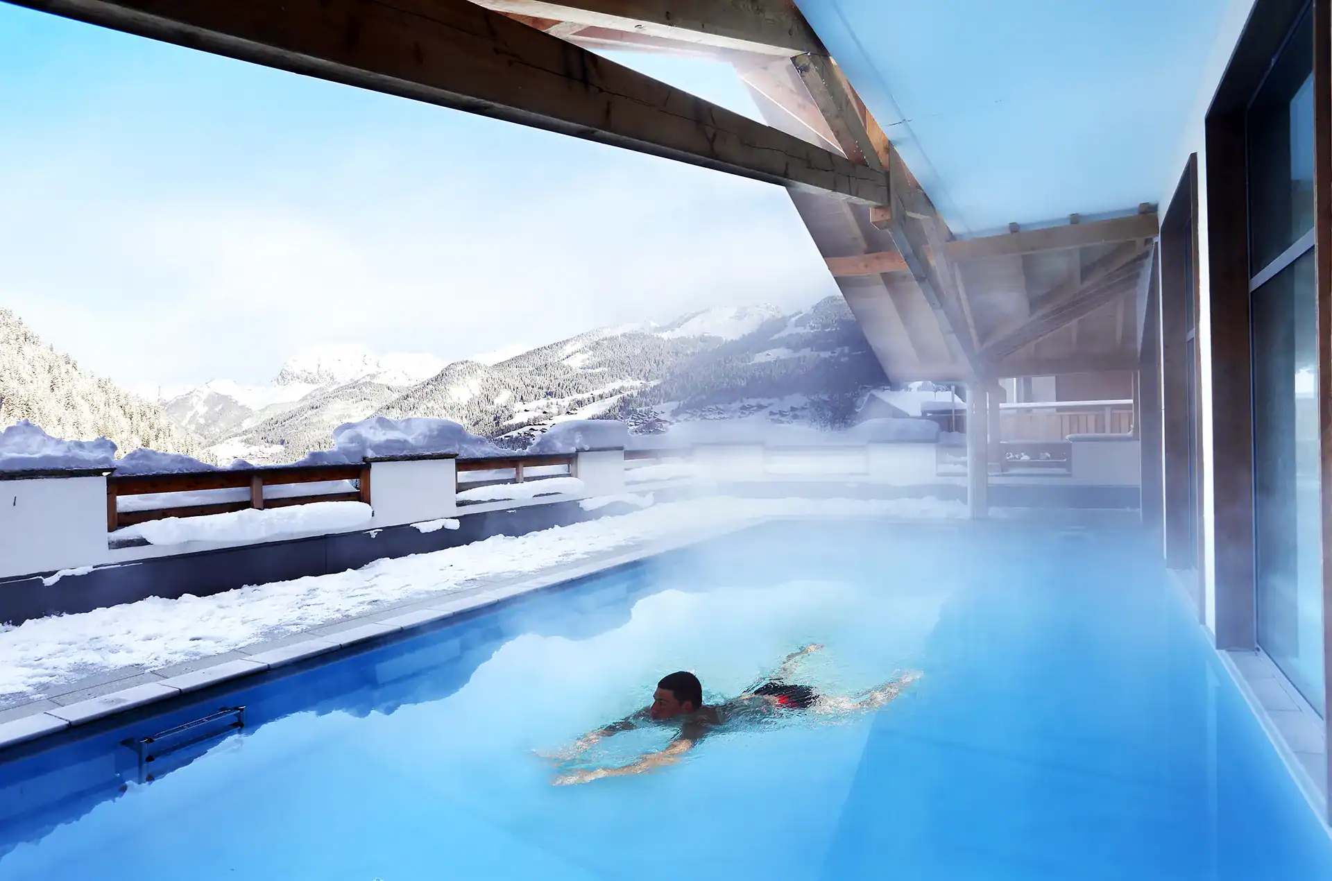 Heated outdoor swimming-pool at the Goélia le Grand Ermitage holiday residence in Châtel