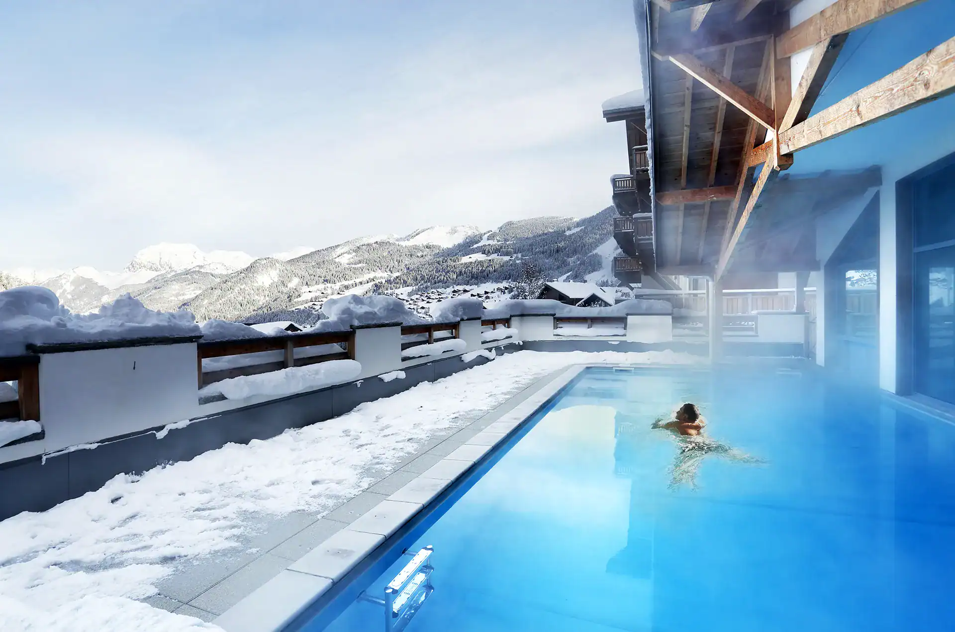 Heated outdoor swimming-pool at the Goélia le Grand Ermitage holiday residence in Châtel