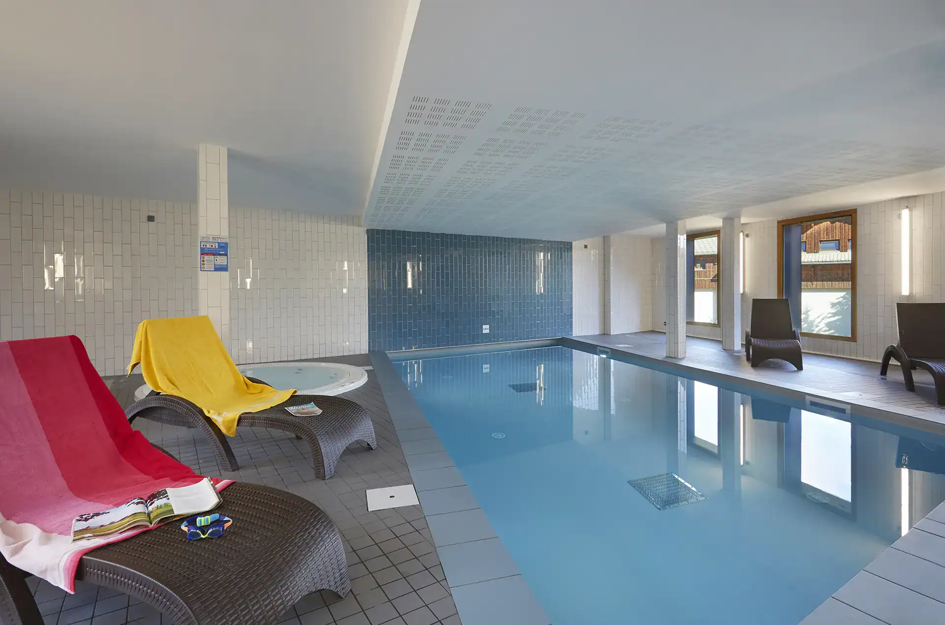 Heated indoor swimming pool at the Goélia le Hameau holiday residence in Les Deux Alpes
