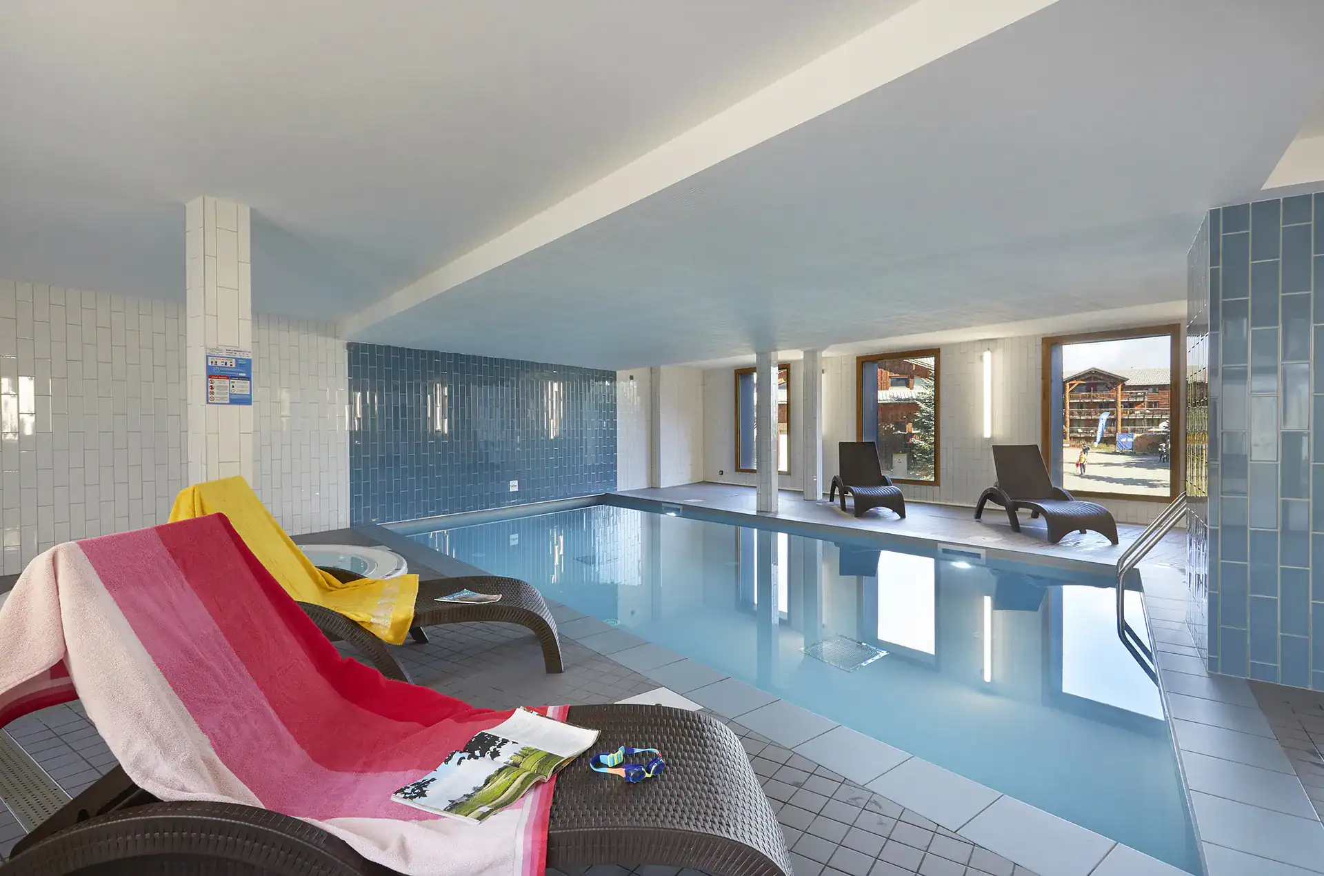 Heated indoor swimming pool at the Goélia le Hameau holiday residence in Les Deux Alpes