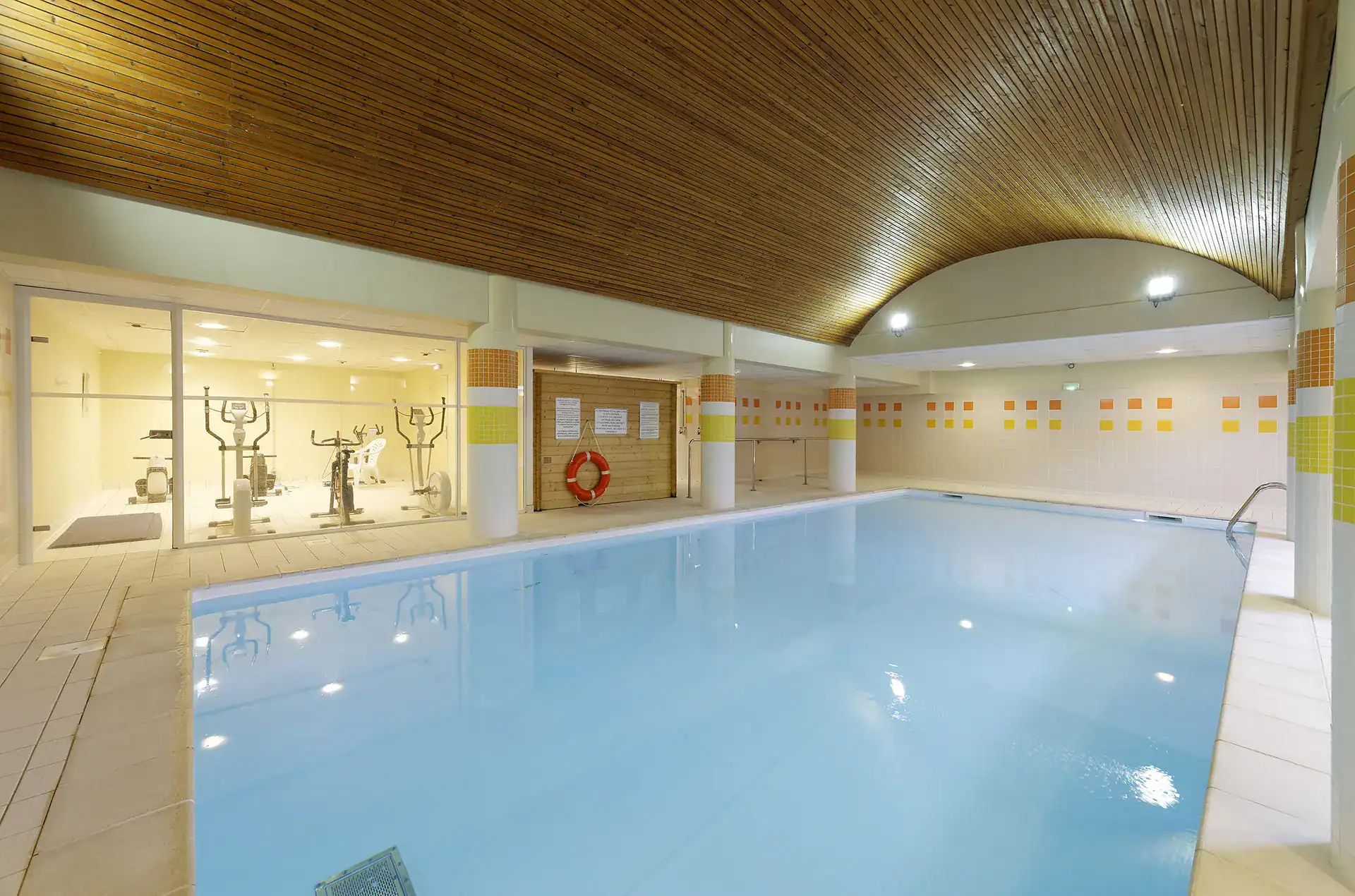 Heated indoor swimming-pool at the Goelia Les Grands Ax holiday residence in Ax Les Thermes
