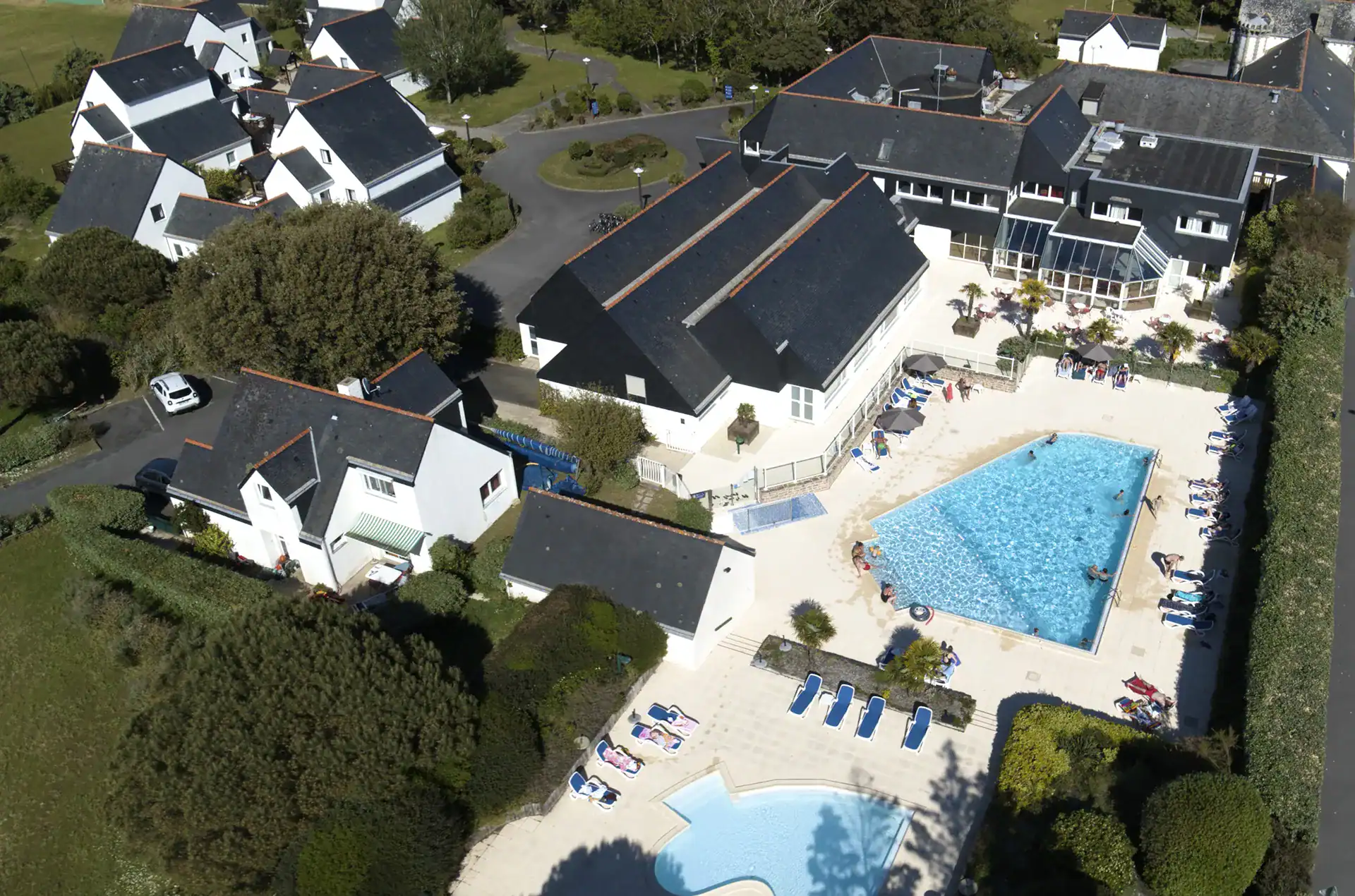 Aerial view of the Goélia Les Voiles Blanches holiday residence in Batz-sur-Mer, right by the sea