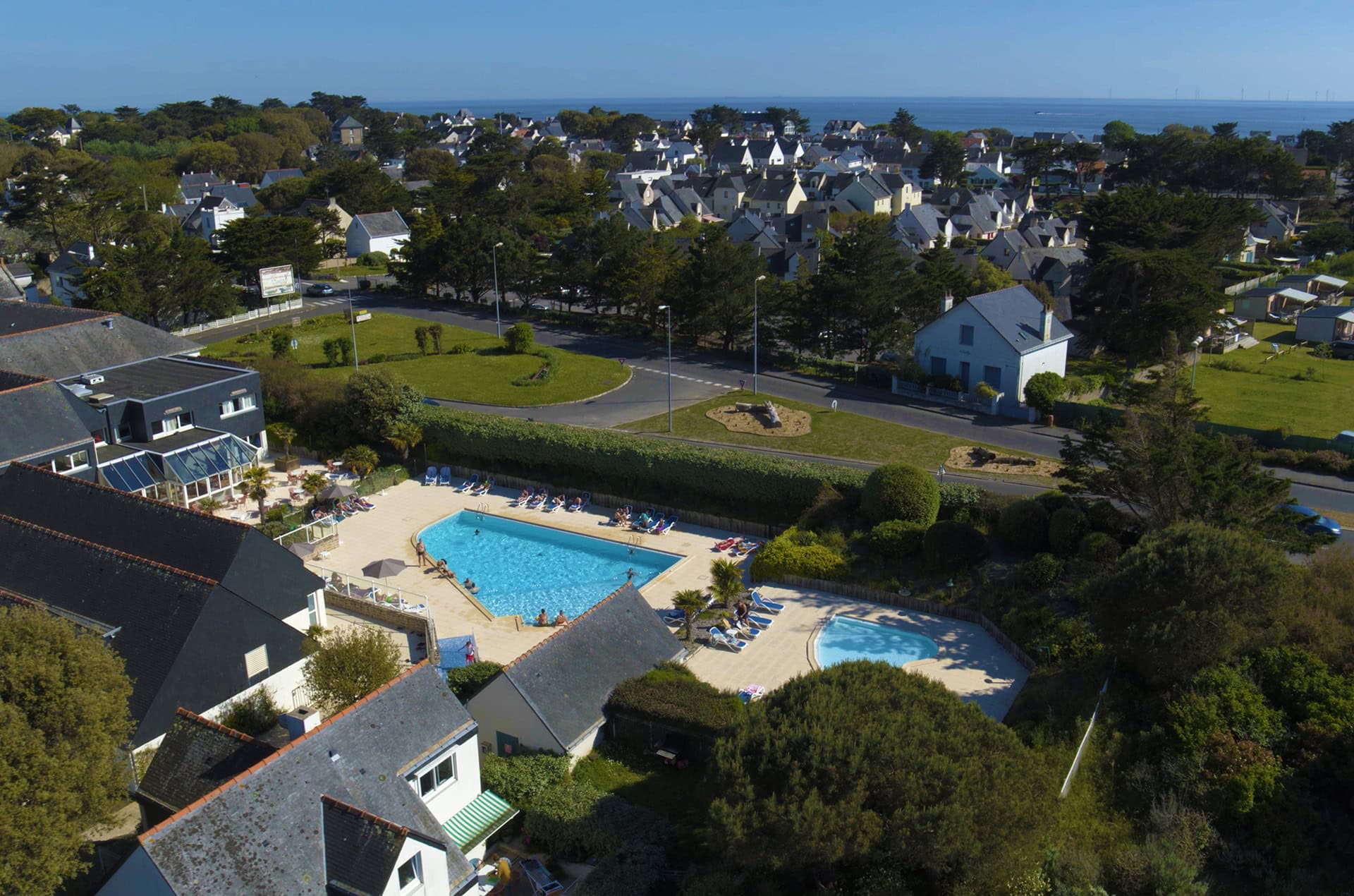 Aerial view of the Goélia Les Voiles Blanches holiday residence in Batz-sur-Mer, right by the sea