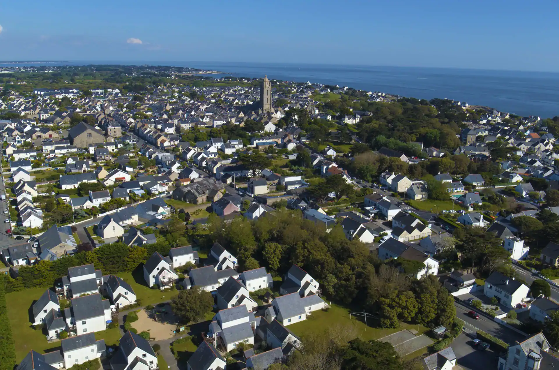 Aerial view of the Goélia Les Voiles Blanches holiday residence in Batz-sur-Mer, right by the sea