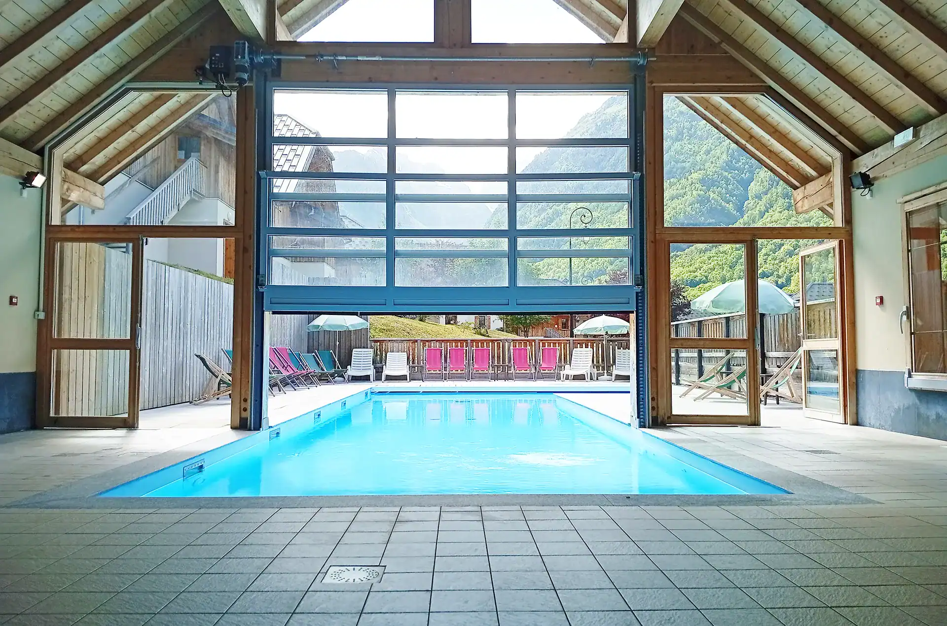 Exterior interior heated pool on the vacation residence Goélia Les Chalets de Belledonne in St Colomban Les Sybelles