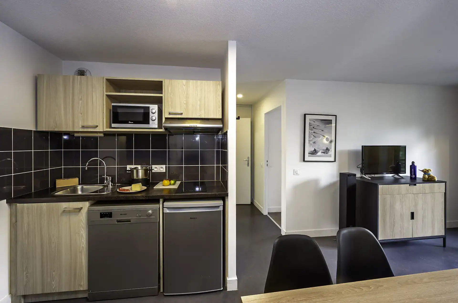 An example of a kitchenette in one of the holiday apartments at the Le Hameau holiday residence in Les Deux Alpes